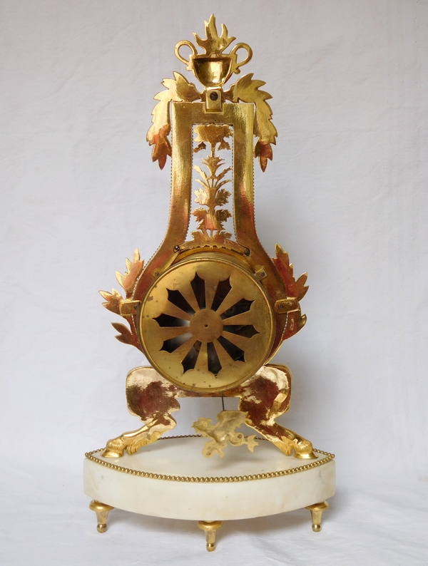 Pendule squelette d'époque Louis XVI Directoire en marbre et bronze doré