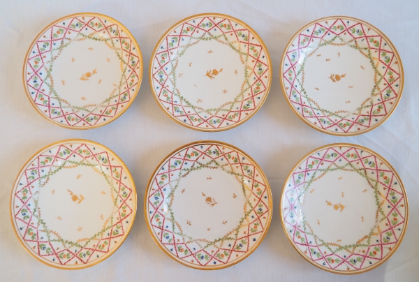 Set of 12 Louis XVI porcelain polychromatic dessert plates enhanced with fine gold, late 18th century