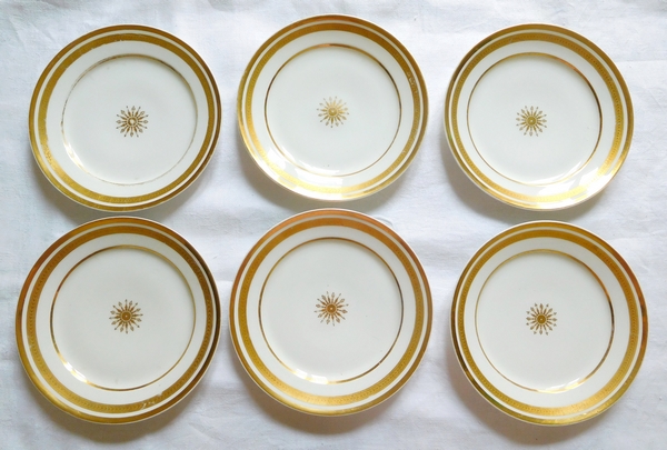 Série de 12 assiettes dorées à l'or fin d'époque Empire - Restauration en porcelaine de Paris