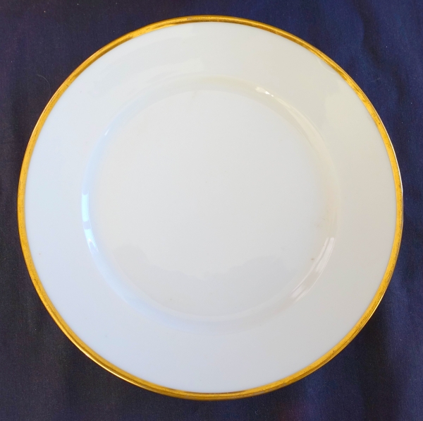 Nast : suite de 14 assiettes de table en porcelaine à filet or d'époque Empire - signées