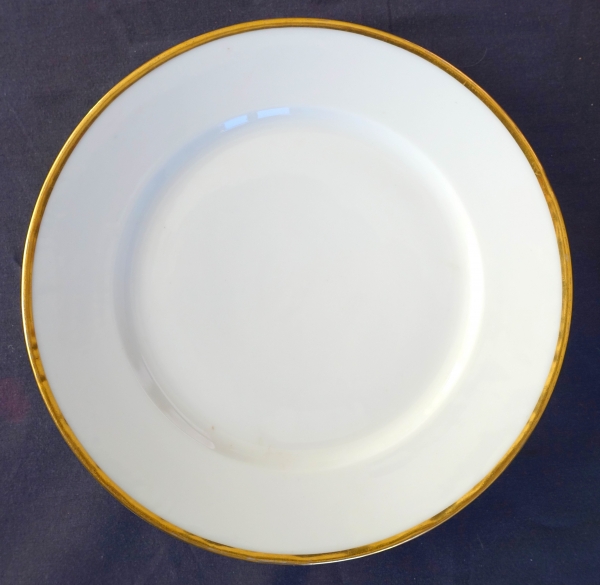 Nast : suite de 14 assiettes de table en porcelaine à filet or d'époque Empire - signées