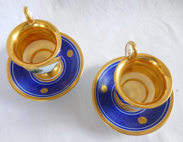 Paire de tasses Empire à décor bleu et or en porcelaine de Paris, époque Restauration
