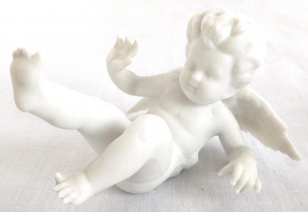 4 biscuit putti somersaulting, Louis XVI style, 19th century production