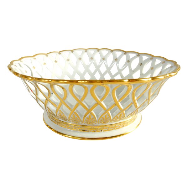 Nast : coupe / corbeille Empire ovale en porcelaine ajourée dorée à l'or fin, signée, début XIXe