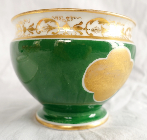 Paris Porcelain chocolate cup, green background enhanced with fine gold - attributed to Nast