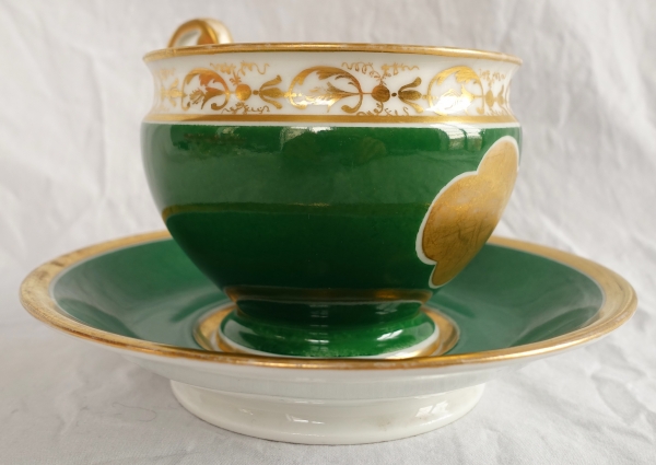 Paris Porcelain chocolate cup, green background enhanced with fine gold - attributed to Nast