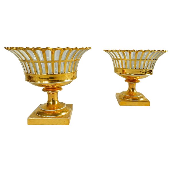 Pair of Empire Paris porcelain reticulated cups gilt with fine gold, early 19th century