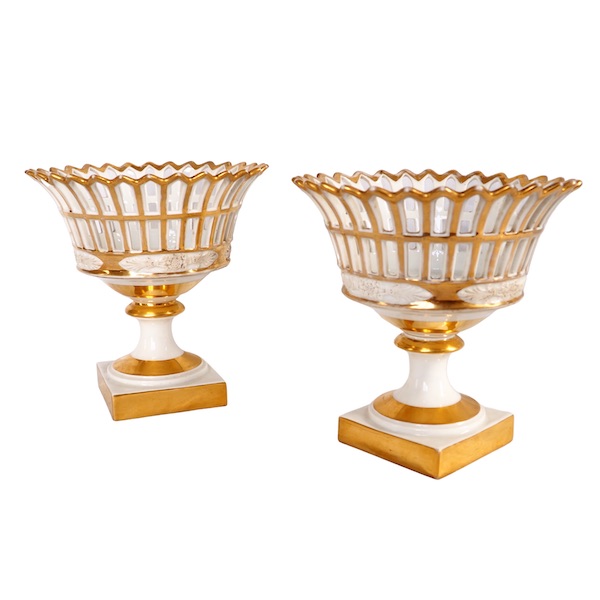 Pair of Empire Paris porcelain reticulated cups enhanced with fine gold, early 19th century