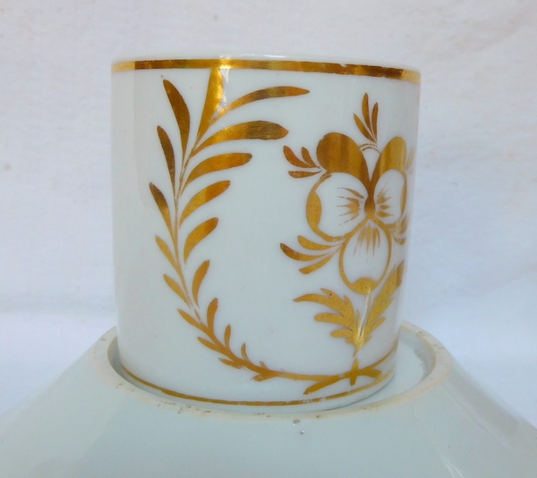 Pair of Empire Paris porcelain coffee cups enhanced with fine gold, early 19th century