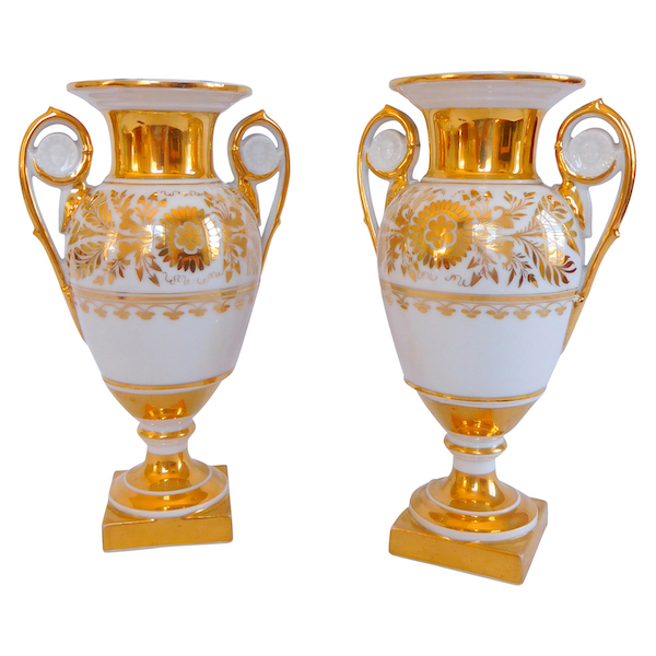 Pair of Empire Paris porcelain vases enhanced with fine gold, early 19th century