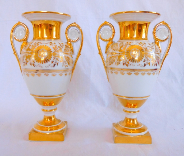 Pair of Empire Paris porcelain vases enhanced with fine gold, early 19th century