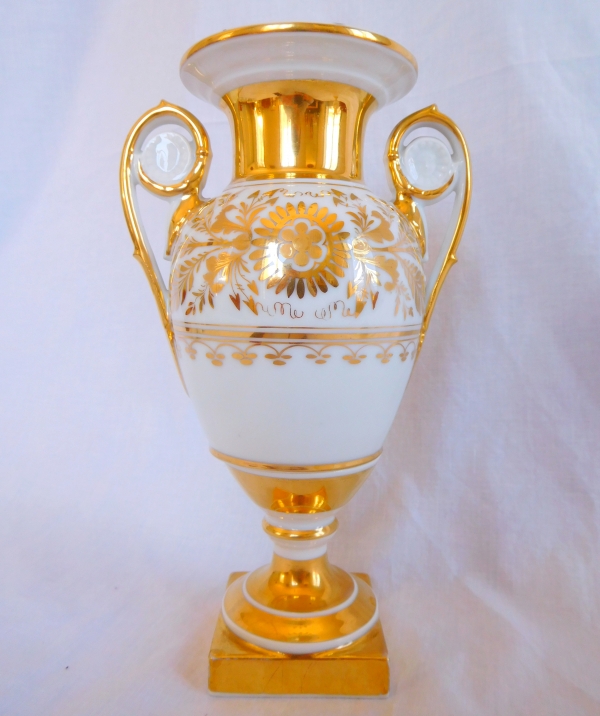 Pair of Empire Paris porcelain vases enhanced with fine gold, early 19th century