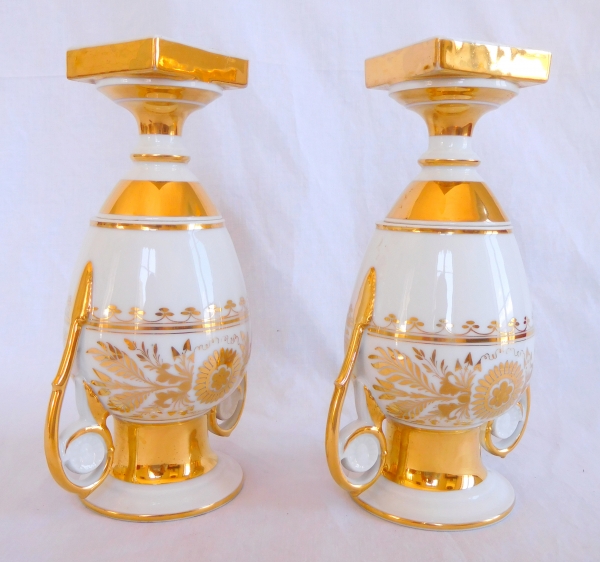 Pair of Empire Paris porcelain vases enhanced with fine gold, early 19th century