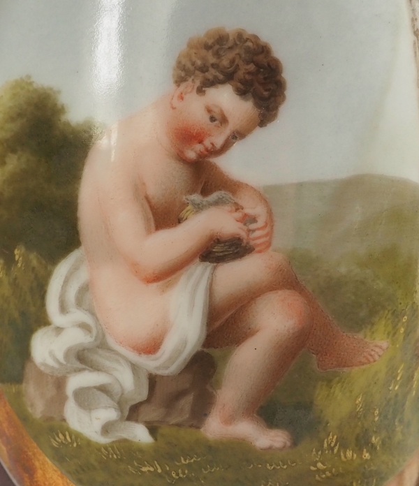 Pair of Empire Paris porcelain vases, polychromatic and gilt decoration - putto stealing eggs
