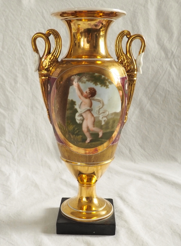Pair of Empire Paris porcelain vases, polychromatic and gilt decoration - putto stealing eggs