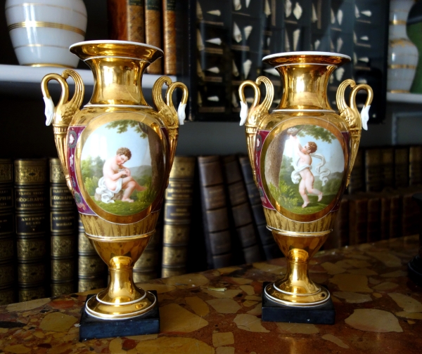 Pair of Empire Paris porcelain vases, polychromatic and gilt decoration - putto stealing eggs