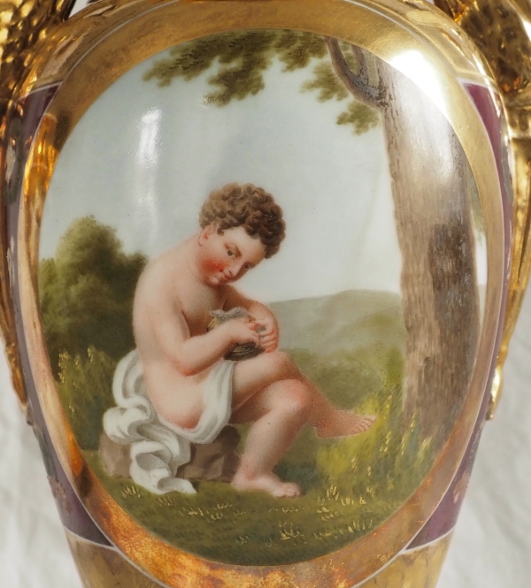 Pair of Empire Paris porcelain vases, polychromatic and gilt decoration - putto stealing eggs