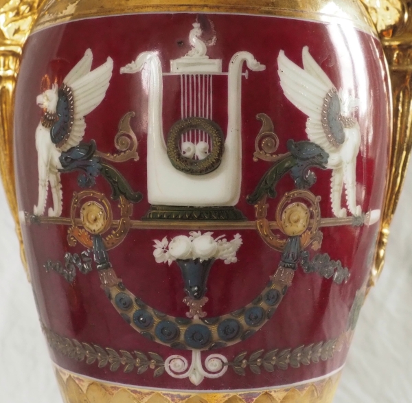 Pair of Empire Paris porcelain vases, polychromatic and gilt decoration - putto stealing eggs