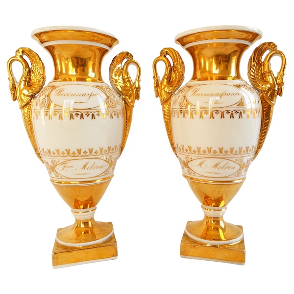 Pair of Empire Paris porcelain vases enhanced with fine gold, early 19th century