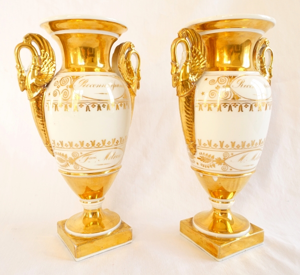 Pair of Empire Paris porcelain vases enhanced with fine gold, early 19th century