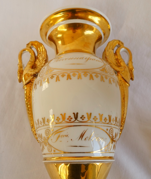 Pair of Empire Paris porcelain vases enhanced with fine gold, early 19th century