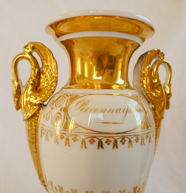 Pair of Empire Paris porcelain vases enhanced with fine gold, early 19th century