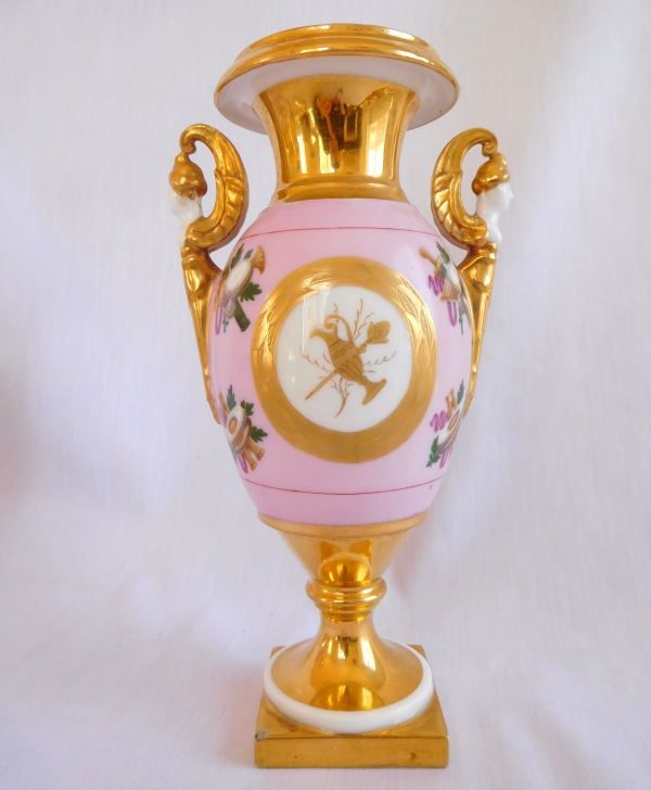 Pair of Paris porcelain Empire vases, pink background enhanced with fine gold, early 19th century