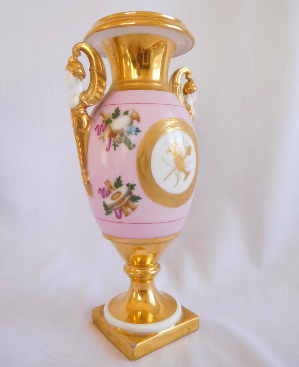 Pair of Paris porcelain Empire vases, pink background enhanced with fine gold, early 19th century