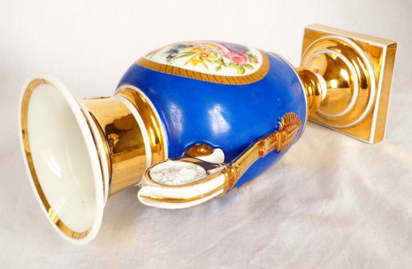 Pair of Paris porcelain Empire vases - flowers on a gilt and blue background - early 19th century