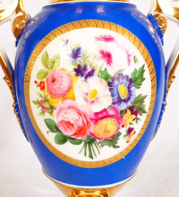 Pair of Paris porcelain Empire vases - flowers on a gilt and blue background - early 19th century