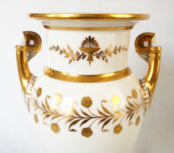 Sevres Manufacture : pair of tall porcelain vases enhanced with fine gold, marble base