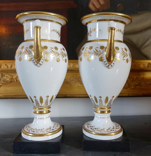Sevres Manufacture : pair of tall porcelain vases enhanced with fine gold, marble base