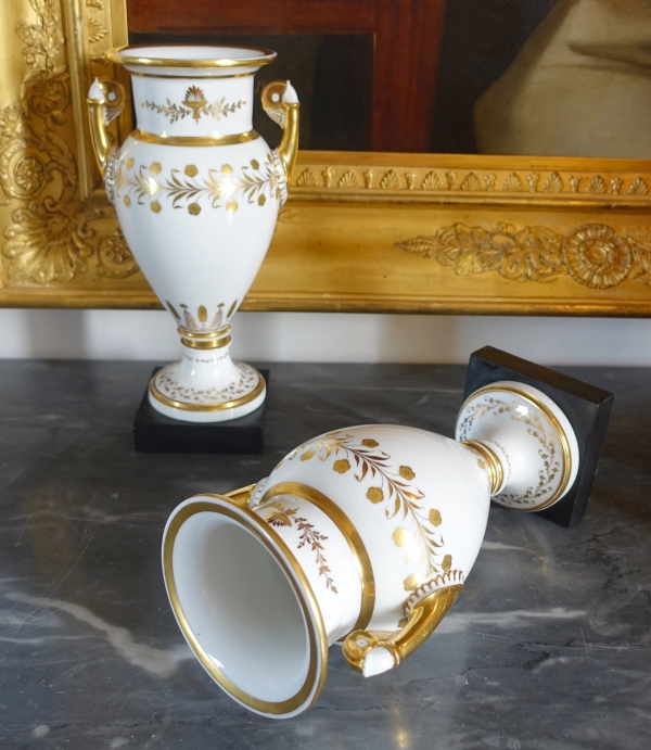 Sevres Manufacture : pair of tall porcelain vases enhanced with fine gold, marble base