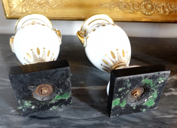 Sevres Manufacture : pair of tall porcelain vases enhanced with fine gold, marble base