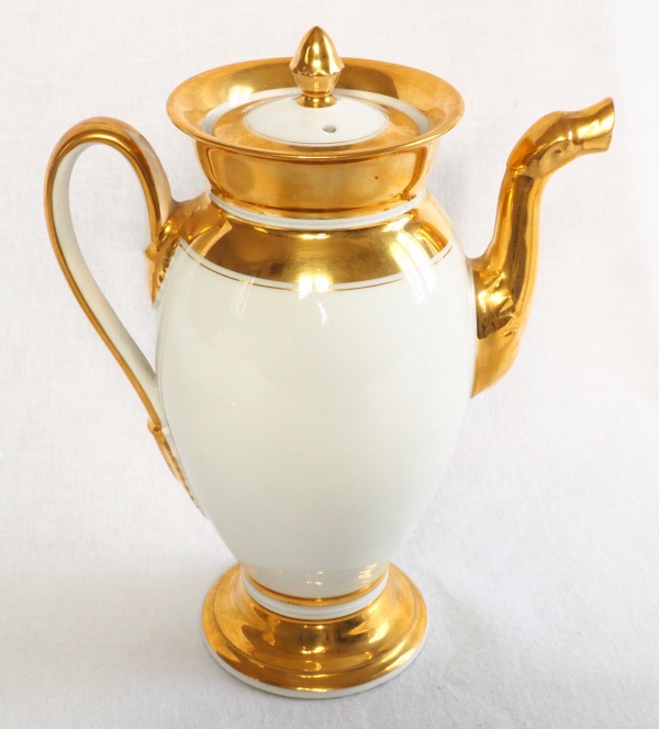 Paris porcelain coffee set enhanced with fine gold : coffee pot, sugar pot, milk jug