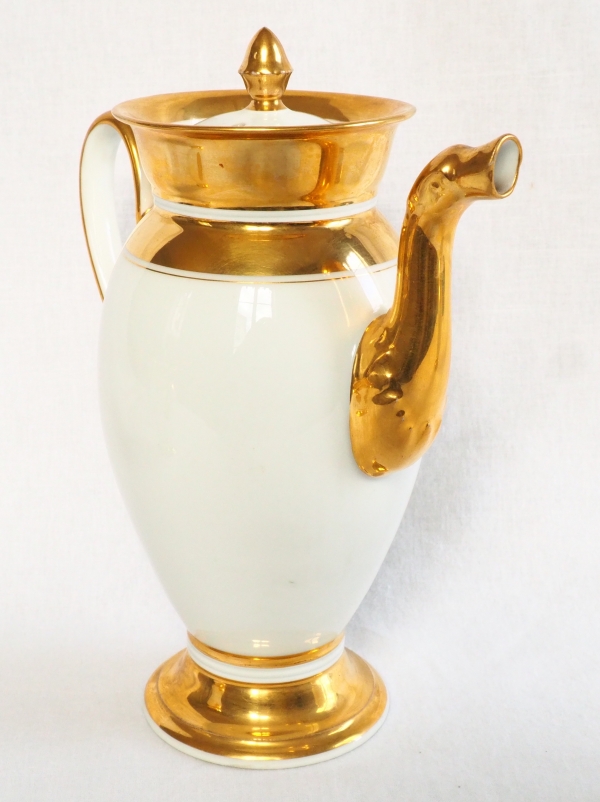 Paris porcelain coffee set enhanced with fine gold : coffee pot, sugar pot, milk jug