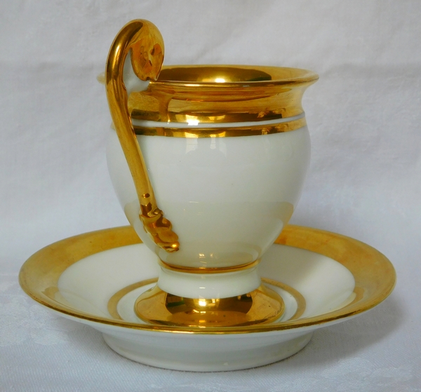 Empire Paris porcelain coffee set enhanced with fine gold, early 19th century, 17 pieces