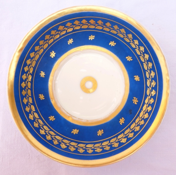 Large cup and its saucer, Paris porcelain - blue coloured biscuit enhanced with fine gold, 19th century