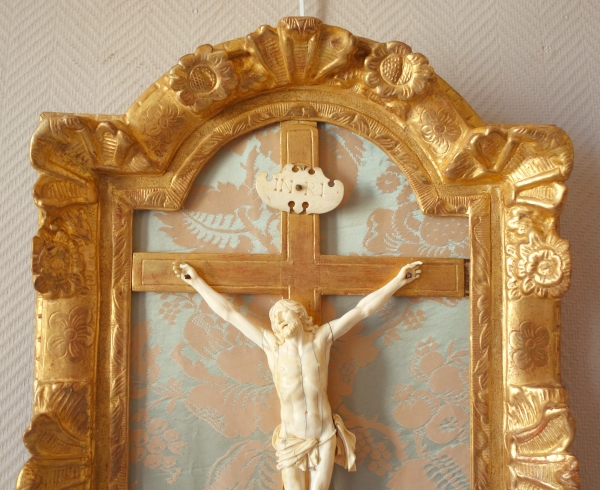 Louis XIV ivory Christ, gold leaf gilt wood frame, 18th century