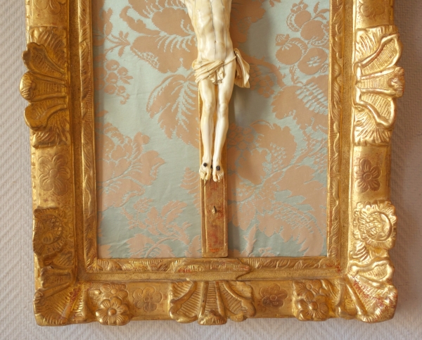 Louis XIV ivory Christ, gold leaf gilt wood frame, 18th century