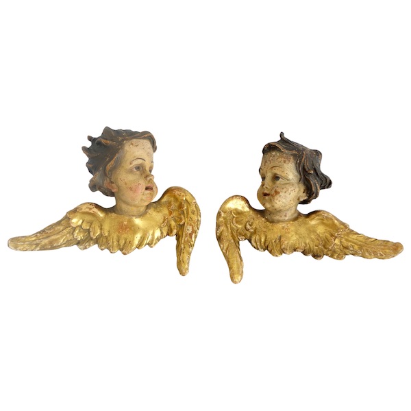 Pair of baroque winged angels busts, polychromatic and gilt wood, early 18th century