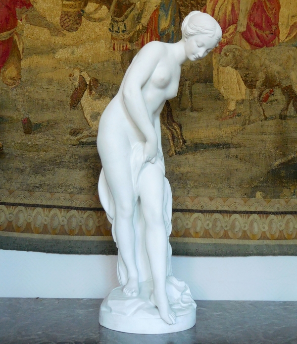 Tall porcelain biscuit statue, The Bather, after Falconet - 67cm