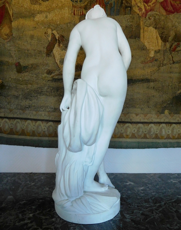 Tall porcelain biscuit statue, The Bather, after Falconet - 67cm