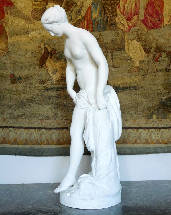 Tall porcelain biscuit statue, The Bather, after Falconet - 67cm