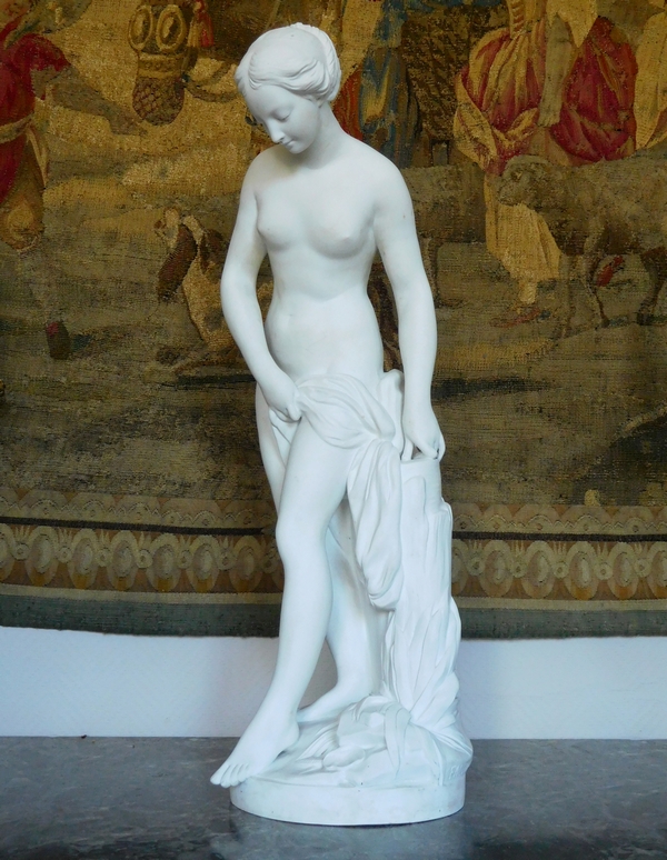 Tall porcelain biscuit statue, The Bather, after Falconet - 67cm