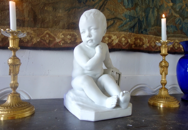 Tall porcelain biscuit : child with a cage after Jean Baptiste Pigalle - 36cm