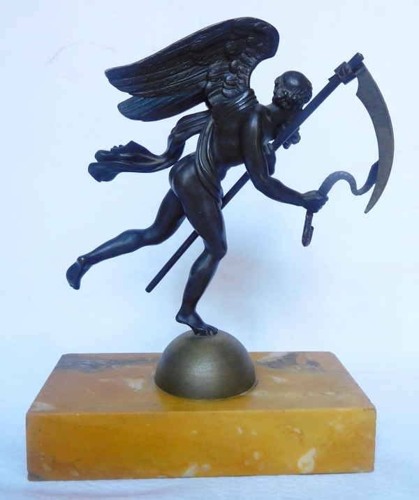 Time flying by (Chronos), allegoric bronze sculpture set on a marble base, early 19th century