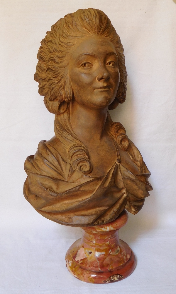 Terracotta bust of an aristocrat on a marble base, 18th century style, 19th century production