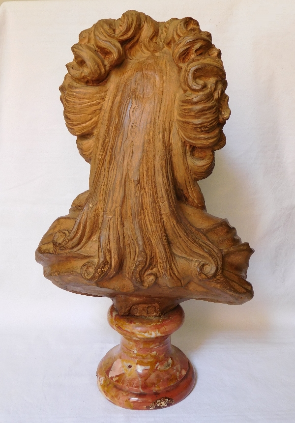 Terracotta bust of an aristocrat on a marble base, 18th century style, 19th century production