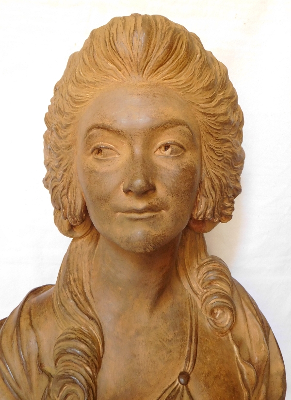 Terracotta bust of an aristocrat on a marble base, 18th century style, 19th century production